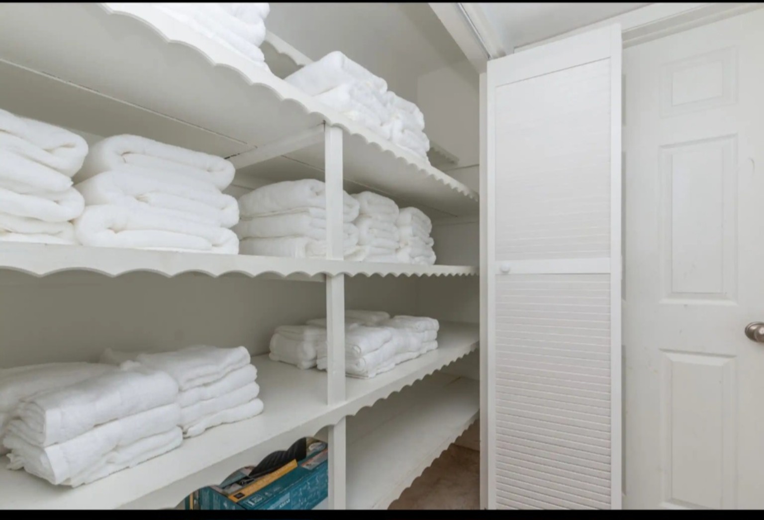 Organized clean linens ready for property turnover